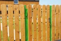 Wooden garden fence door. Wood fence - house wood fencing. Royalty Free Stock Photo