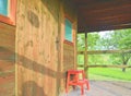 Wooden garden shed in a beautiful rural orchard. Close-up Royalty Free Stock Photo