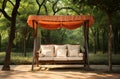 Wooden garden swing in natural green garden. Garden swing chair Royalty Free Stock Photo