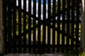 Wooden gate in the foreground and in the background the buc