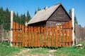 Wooden Gate in front of Village Wooden House