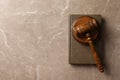 Wooden gavel and book on table, top view. Royalty Free Stock Photo