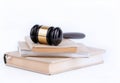 Wooden gavel and books in background. Law and justice concept Royalty Free Stock Photo