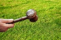 Sale concept,wooden gavel  on land background Royalty Free Stock Photo