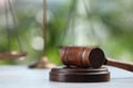 Wooden gavel on grey table against blurred background Royalty Free Stock Photo