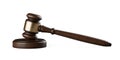 Wooden gavel, judges hammer or mallet on dark wood table over black background, law, legal or court symbol or concept