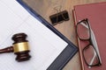 Wooden Gavel law book and notepad in office Royalty Free Stock Photo