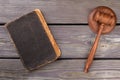 Wooden gavel and old law book. Royalty Free Stock Photo