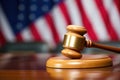 a wooden gavel resting on a podium