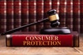 Wooden Gavel And Soundboard On Consumer Protection Law Book Royalty Free Stock Photo