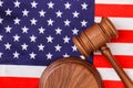 Wooden gavel on the US flag. Royalty Free Stock Photo