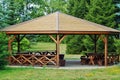 Wooden gazebo in spring parks