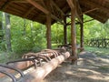 Wooden gazebo for vacationing cyclists. Bicycle parking Gazebo