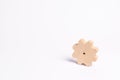 Wooden gear on a white background. Abstract background for presentations and banners. The concept of technology and industr