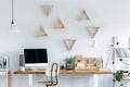 Wooden geometric frames on wall