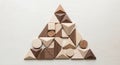 Wooden geometric shapes arranged into a Royalty Free Stock Photo