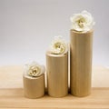 Wooden geometrical pieces with white roses