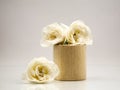 Wooden geometrical pieces with white roses