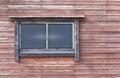 wooden and glass window in the redwood wall Royalty Free Stock Photo