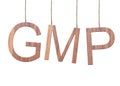 Wooden GMP text of Good Manufacturing Practice hanging on the ropes.