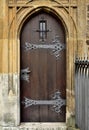 Wooden gothic door with ornamental ironwork. Cathedral of St. Peter and Paul in Brno. Front view. Royalty Free Stock Photo