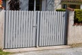 Wooden gray gate wood portal of suburb house door access Royalty Free Stock Photo