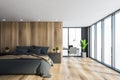 Wooden and gray master bedroom with home office Royalty Free Stock Photo