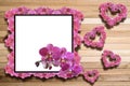 Wooden greeting frame with orchids Royalty Free Stock Photo
