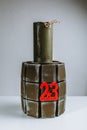 A wooden grenade, an original gift to the military