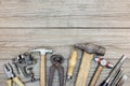 Wooden grey plank table background with various old and rusty in