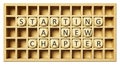 a wooden grid with cubes start a new chapter Royalty Free Stock Photo