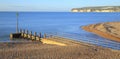 Wooden groyne on the beach