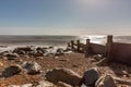 A wooden groyne on Pett Level beach in Sussex, on a sunny September day