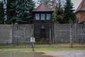 Wooden guard tower with barbed wire fencing. Auschwitz concentration camp, Poland.