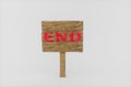 Wooden guide board with `end` word on it, 3d rendering