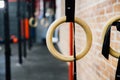 Wooden Gymnastic rings in the interior of the gym loft. Nobody. Royalty Free Stock Photo