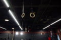 Wooden Gymnastic rings in the interior of the gym loft. Nobody. Royalty Free Stock Photo