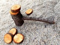 Wooden hammer and pieces of cherry tree, carpentry and construction objects