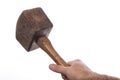 Wooden hammer held in a man& x27;s hand. Carpenters accessories