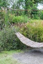 Wooden hammock with metal chain