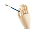 Wooden hand and brush Royalty Free Stock Photo