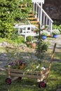 Wooden Hand Cart Full Of Flowers