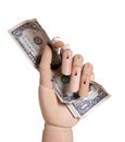 Wooden hand holding dollars Royalty Free Stock Photo