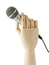 Wooden hand holding a microphone Royalty Free Stock Photo