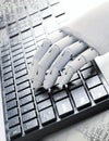 A wooden hand is typing Royalty Free Stock Photo