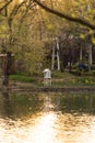 Wooden handcrafted house decoration by the river at golden hour