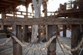 Wooden handrails with intertwined rope close up