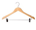 Wooden hanger with metal clothespins isolated on white background