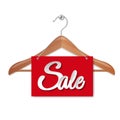Wooden Hanger With sale Paper banner Isolated White Background Royalty Free Stock Photo