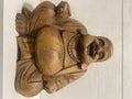 Wooden happy buddha. Clipping path included. No photoshop. Royalty Free Stock Photo